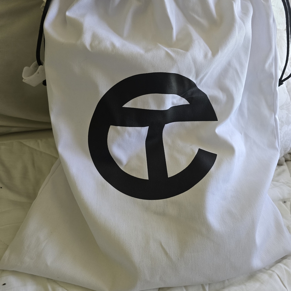 White Drawstring Bag with Black Logo